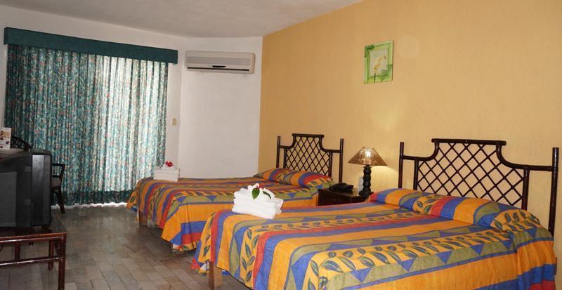 Las Perlas Condos Cancún Rom bilde